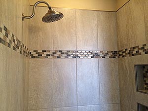 Broken shower was replaced with new, custom tiled shower